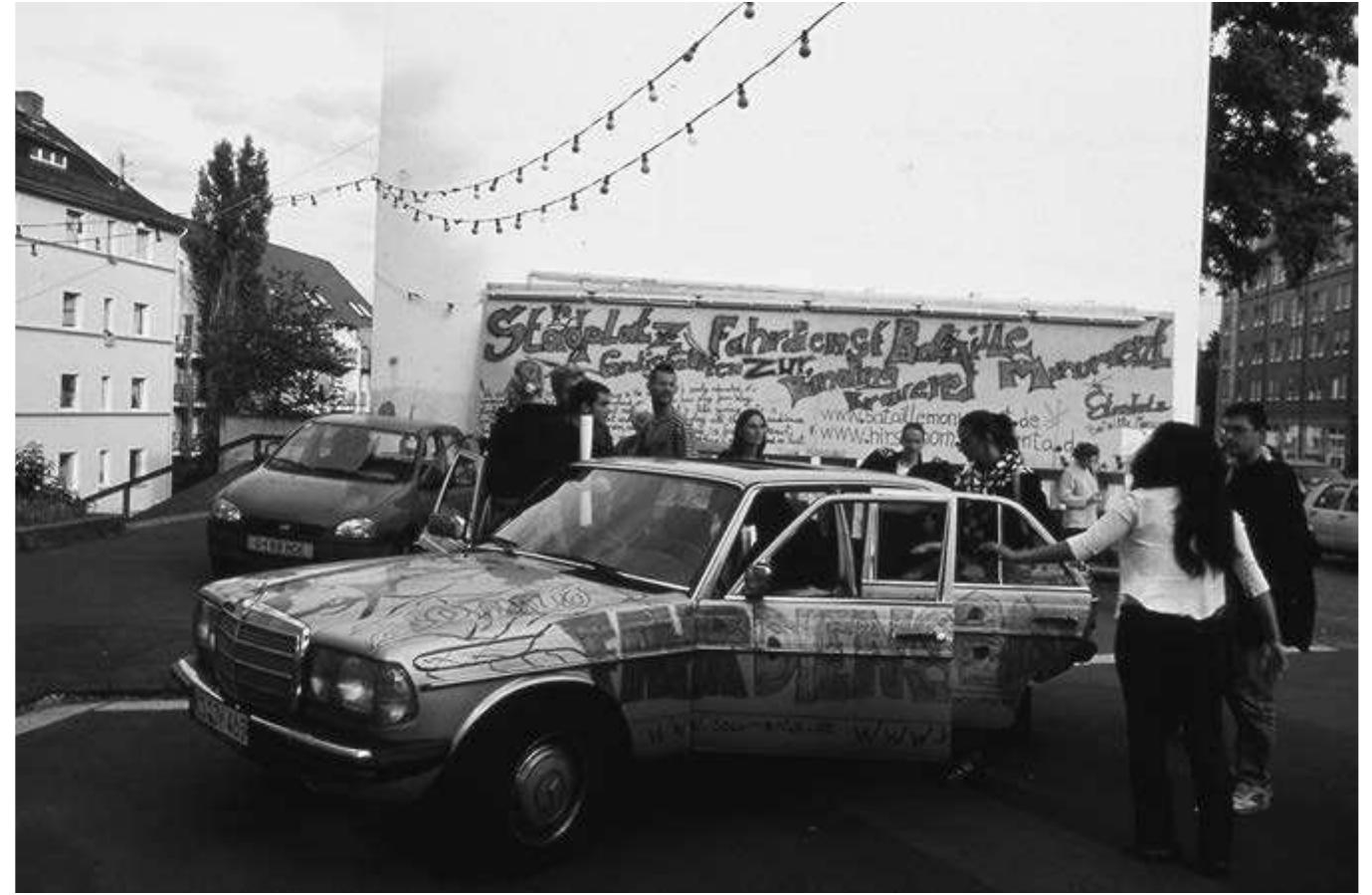 working in public space, came not just to resemble monuments in their perfor- mances but to be interested in just those problems of political representation ind its relation to the spectator that drove Musil’s questions about monuments. They thus reoriented public art around an intersection of performance and the monument, of which Hirschhorn is only a recent manifestation. There are many varieties of this engagement, which in its paradigmatic form I call the perfor- mative monument. Their common denominator, audience participation, is an inheritance of performance art. Some are ephemeral objects in a literal sense - like the Bataille Monument, dismantled after documenta closed. This might suggest ephemerality as their practice, and main affinity to performance, but his suggestion is deceptive. For instance, the cars used for the shuttle service of the Bataille Monument were auctioned on eBay - signed by the artist, no ess (Figure 2). Does that mean that a part of Hirschhorn’s monument persists in some collector’s home, or, unsettling thought, plies the streets of Europe? I should say not: there is no medium-specific law of ephemerality of objects in olay, endangering the ‘precariousness’ of Hirschhorn’s temporary monument. What I see, rather, is the paradoxical situation that the temporal limitation of ‘he monument has given it a retrospective interest issuing in such actions as the auction. In any case, an interest in a past event, not in a present artefact, motivated the sale and other extensions of the Bataille Monument. And that, 1owever marginally, makes that summer's event in Kassel — not the tree stump, not the car - into a performative monument.  