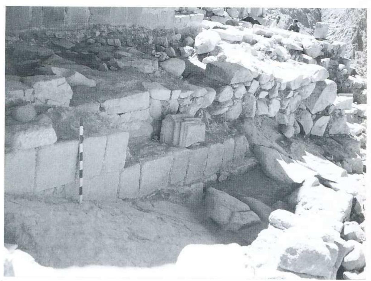Figure 26. The pre-Justinianic structure (Julianos’s fourth-century chapel?) enclosed within the north aisle of the sixth-century basilica, view from the north. A pilaster-capital on the north wall of the basilica. Courtesy of the photographic archive of the Hellenic Archaeological Mission to South Sinai. 