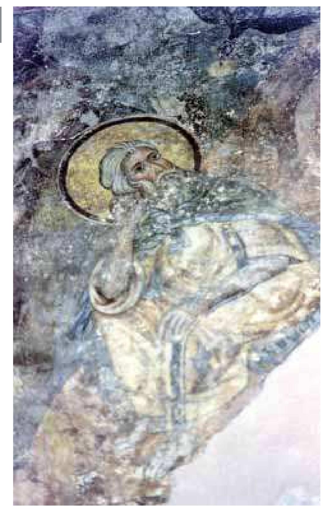 dance with the customary iconographical tradition”. He is holding an open scroll with a passage from Psalm 41, 9-10. O ECOIO[N]/ APTOYC M[OY] / EMETAAY[NENJ/ EIT EME [IITEP]/ NICMON C[Y]/ AE K(bpi)E EAE[H]/ CON ME K[E]/ANACTI[CON/ ME] KE AN[T/AIIOAQCQ]. (Who ate of my bread, has lifted the heel against me. But you, O Lord, be gracious to me, and raise me up, that I may repay them) (fig. 10).  The corresponding figure to the right is the prophet Teramiah nnecaethe four creat brophete whace phronhe: 