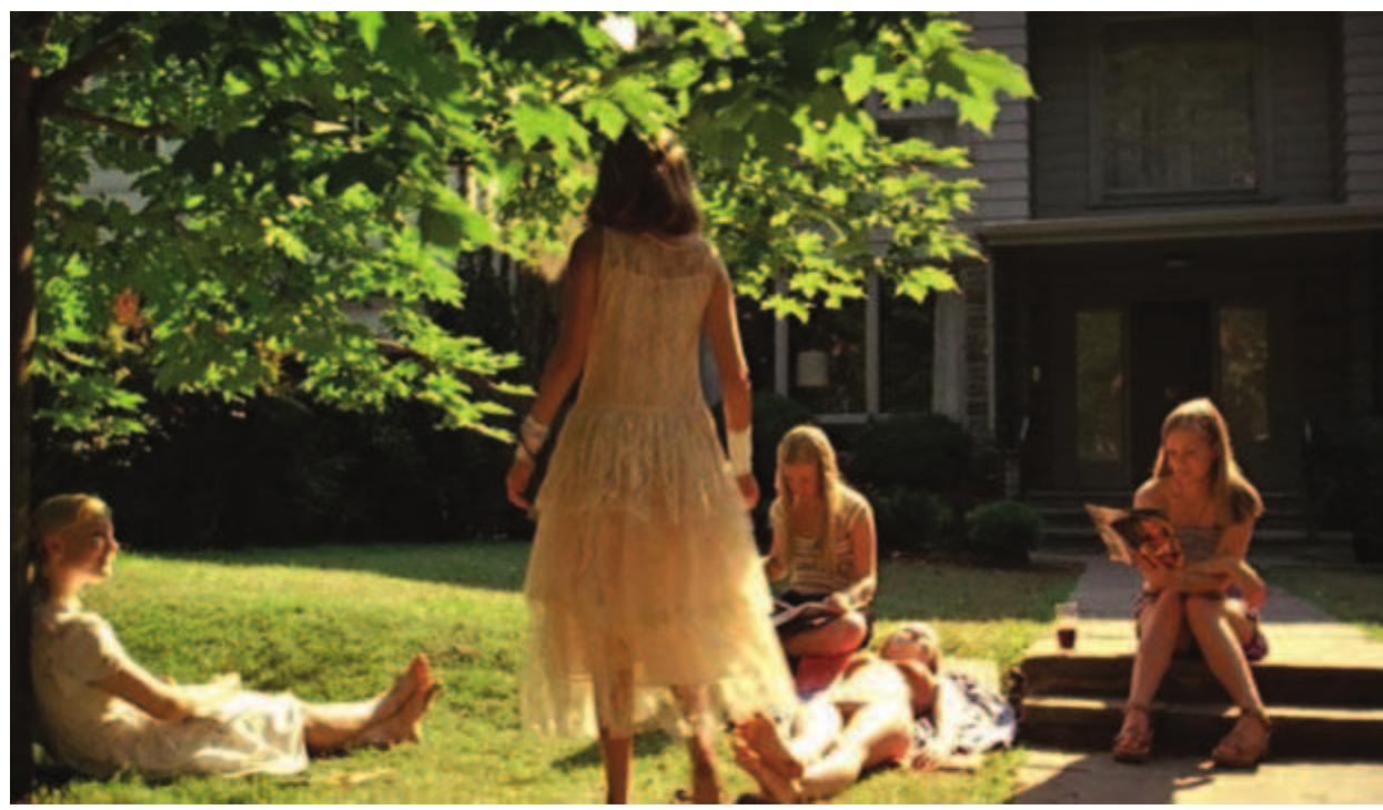 Figure 4: Cecilia in a vintage white wedding dress. Visual references to Lolita are also evident in The Virgin Suicides. The very first scene of the film features Lux in a reddish-pink dress eating what appears to be a candy apple. This image has conventionally been associated with the image of Lolita. Earlier in the film, Lux is moreover seen sunbathing on her towel, wearing a bikini, which, according to the narrator, ‘caused the knife- sharpener to give her a 15-minute demonstration for free’. This scene not only gives prominence to the idea that Lux is self-assured, comfortable with her charm, but also recalls Stanley Kubrick’s film adaptation of Nabokov’s Lolita (1962). This intertexual reference to Lolita is particularly evident in the