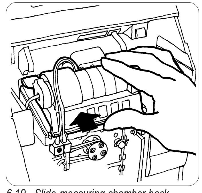 Operator functions checking reagent fluid level and changing