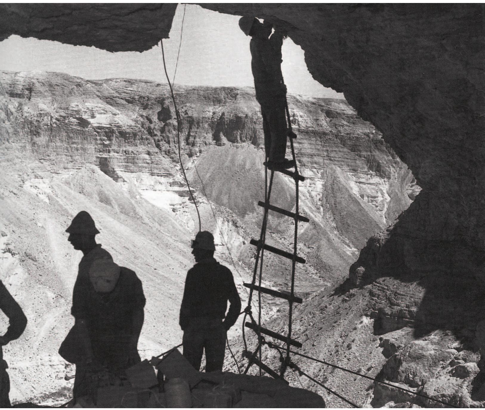 Figure 16. The entrance to the Nahal Mishmar cave situated in the vertical cliff. Photograph courtesy of the Israel Exploration Society, Jerusalem.  lated petrographic groups: ‘Motza clay-dolomitic sand’ and ‘Motza marl-calcareous sand’. These groups are both attributed to the different units of the Motza formation which outcrops in the Judaean mountains, and is exposed in rather small ranges even near Ein Gedi itself. Hence, this study indicates that “the pottery found at the Ein Gedi shrine was produced exclusively in Judaea and/or the Judaean Desert” (291-92; italics mine). As to the pottery assemblage from the Nahal Mishmar cave, which radically differs from that of the Ein Gedi temple, Goren reiter- ated his firm conclusion that the hoard originated elsewhere: “It seems that the whole range of finds [from the cave], rather than the treasure alone, originated in an interregional centre of some kind. Evidently, this centre was not the Ein Gedi shrine since it comprised an assemblage of a totally different nature” (297).  In the same study Goren discussed the analysis of a number of mace heads and standards from the Nahal Mishmar hoard whose core is made of clay (Goren 1995, 304-05). In nine out of ten mace heads the clay belongs to the “Taqiya marls-vegetal matter/calcareous sand” group. “The taqiya formation is exposed in the northern and central Negev, in the Judaean Desert and along the western slopes of the Judaean-Samarian anticline” (302). As to the core of the three examined standards it includ- ed sand, apparently “inland Aeolian sand” rather than “coastal sands” (304). Goren concluded that “the copper artefacts were 