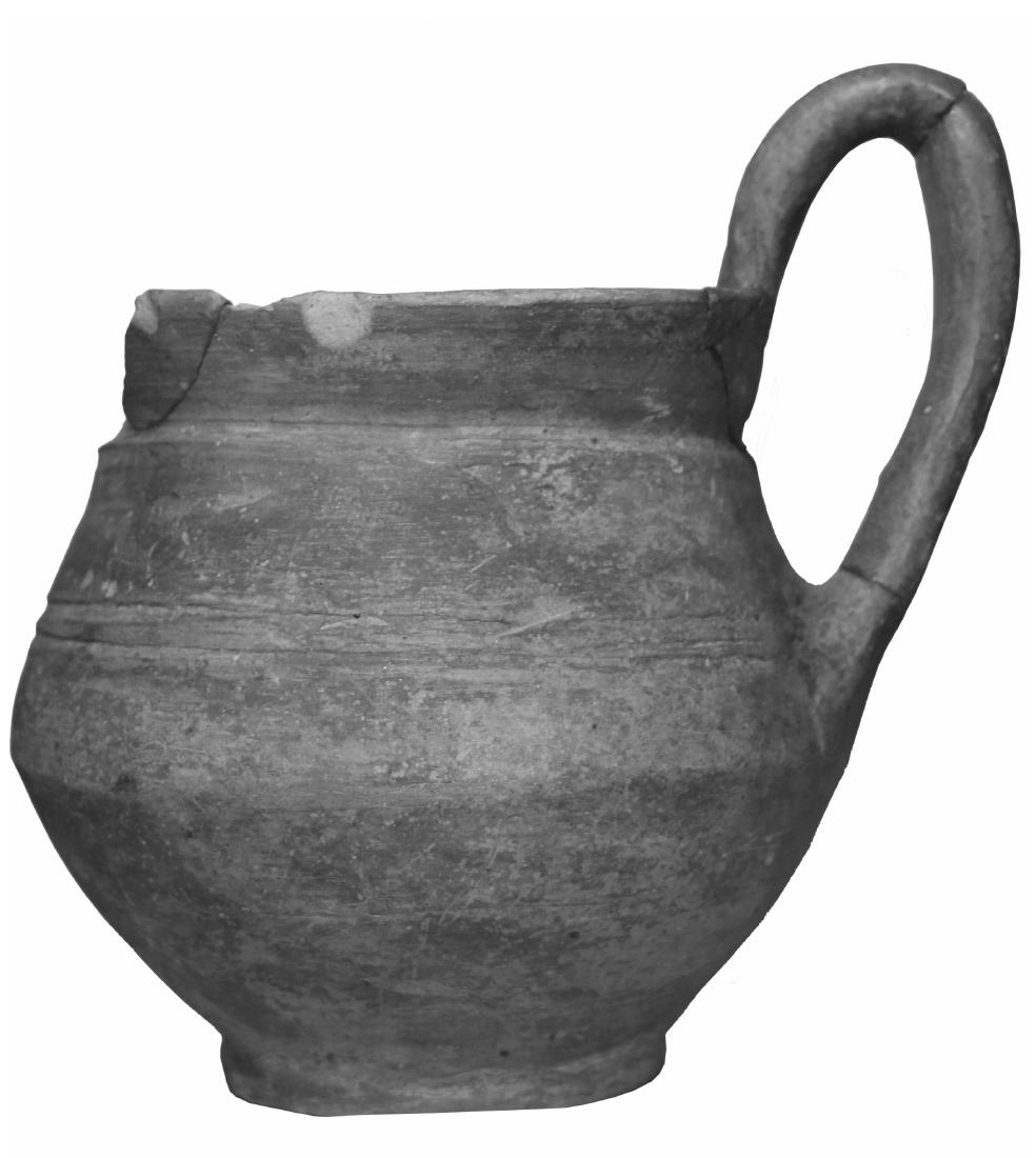 Figure 7. Grey Ware one-handled cup from Berezan’ (Courtesy of S. L. Solovyov, St. Hermitage Muscum, St. Petersburg).  Figure 6. Grey Ware one-handled cup from Beidaud (after Lungu et al. 2007, pl. 4 1, 3). 