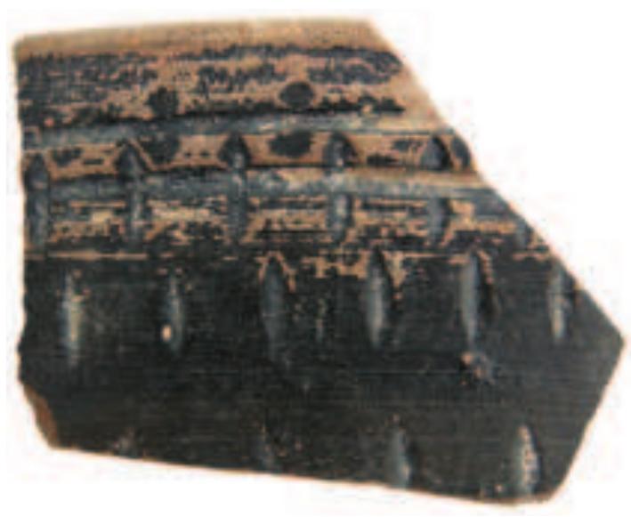 Fig. 15 Roulette-decorated bowl — F133. 