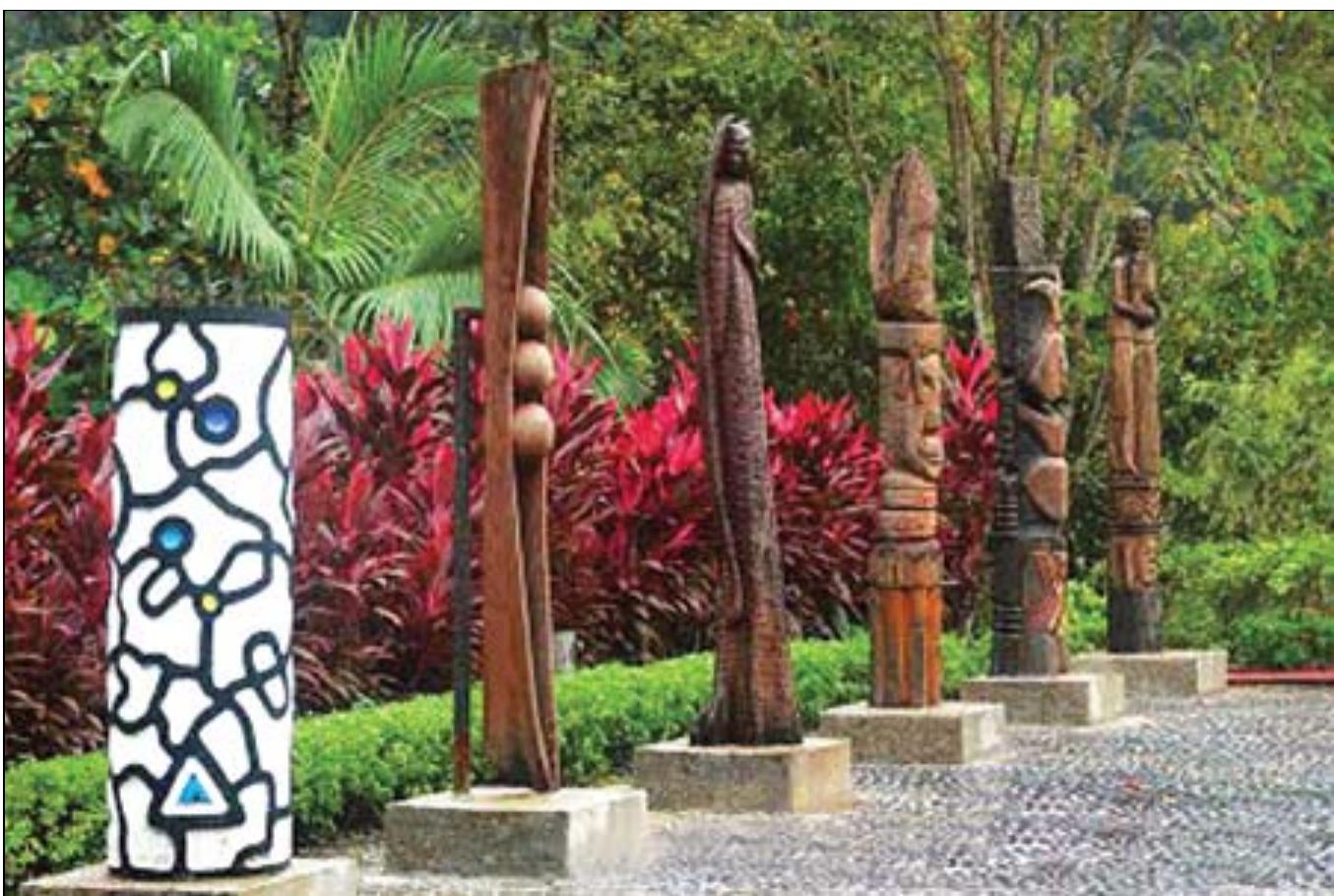 - sculptures and landscape guiding the entry.