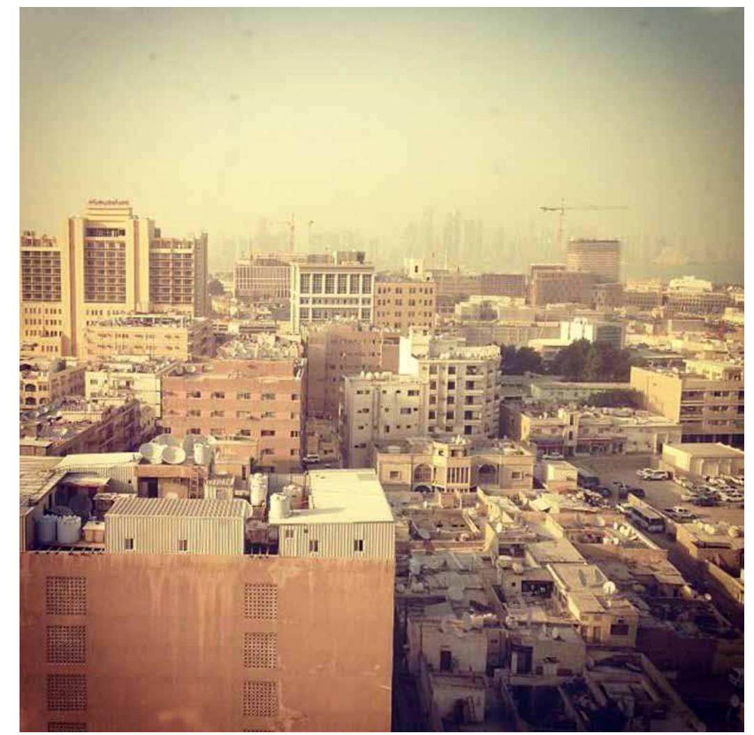Figure 7. High-rise buildings replacing the low-rise traditional houses in old Doha. In order to create the new modern image of Doha, land reclamation started in 1978 to provide space for the mushrooming new high-rise concrete and glass towers. During the 1970s Doha’s