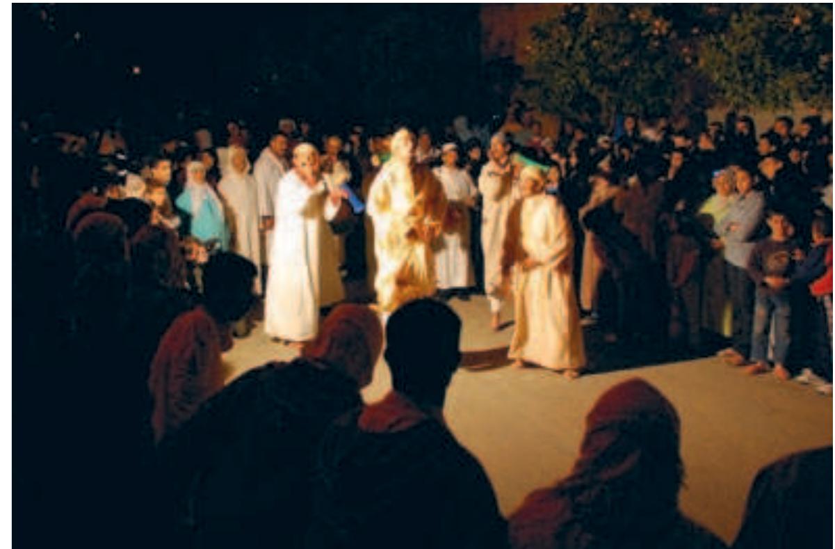 The spectacular entry of an ‘lsawa congregation gets filmed at a ritual Photo: Martin Zillinger, 2008  personal archives of the adepts. Moreover, through the recording, the trance dancers are able to consciously observe the spirits as they take form in their bodies. Especially remarkable events can be recalled, and the experience of “communitas” during the ritual reconstructed. De- ceased and migrated members of the congregation are remembered, and social relations reconsidered. 