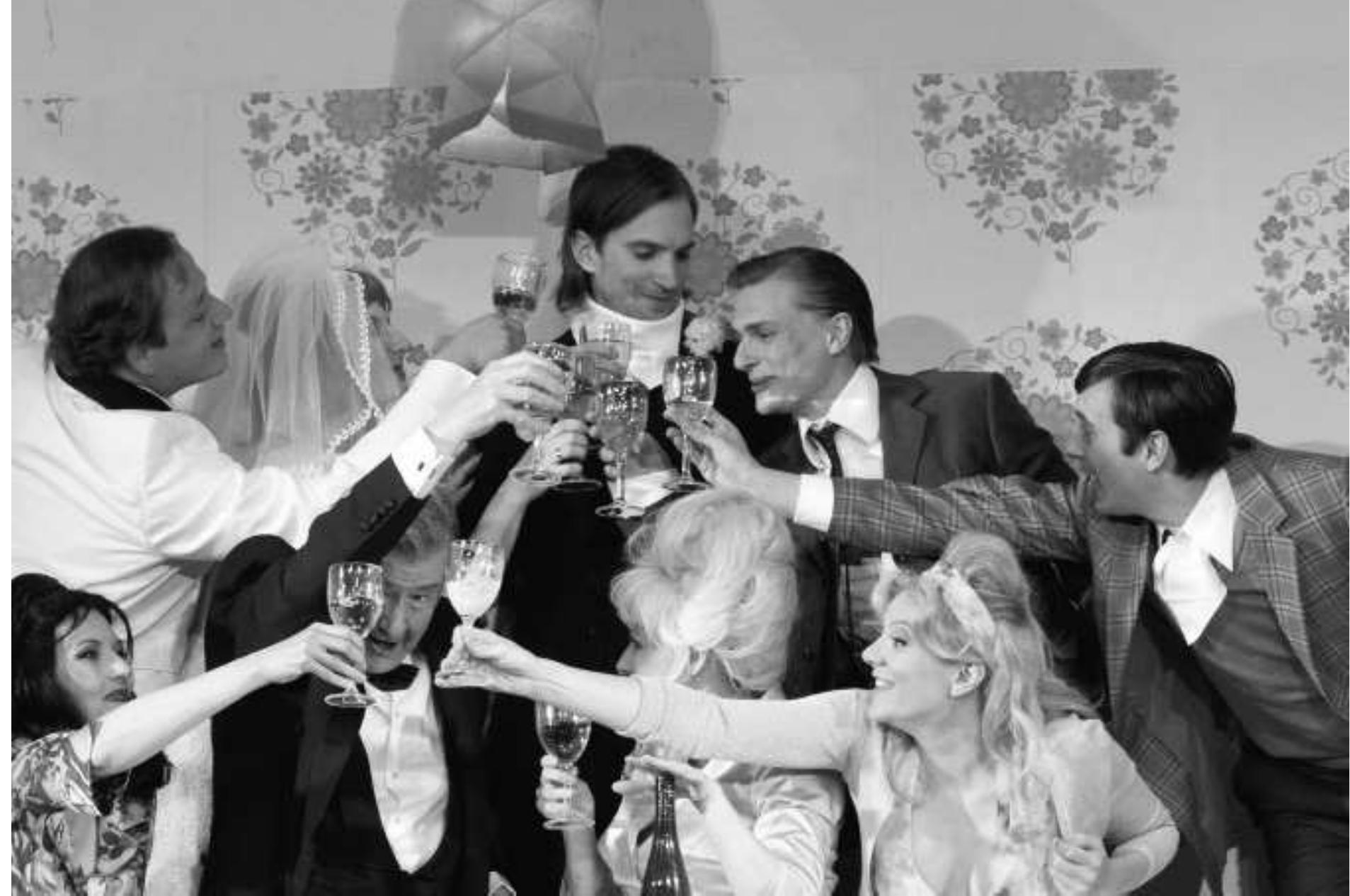 Bertolt Brecht's Die Kleinburgerhochzeit, directed by Dagmar Schlingmann. Photo: Thomas Jauk.  Downstage Irom the dining room was a sloping platform, and below that a flat area where the dancing took place. When the bride and groom danced with other guests in an attempt to make one another jealous, the performers went wild, calling to mind some of the excesses of the sexual revolution. The groom's lascivious dancing was so over the top that at one point he fell off of the stage and into the audience. The production found even more comic potential in the groom's shoddily built furniture, which fell apart right on cue. The final offstage collapse of the bed at the end drew loud guffaws  One of the shows premiering in the space 