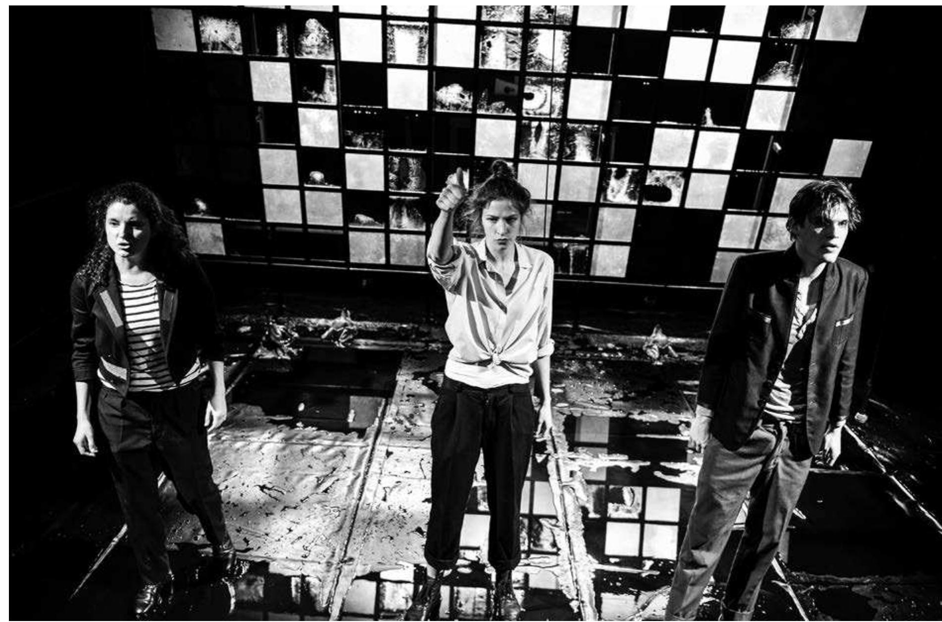 Maria Milisavljevic's Brandung, directed by Christopher Ruping. Recklinghausen, 2013. Photo: Arno Declair.  The set designed by Jonathan Mertz appeared to be a large window with numerous small panes of glass suspended above the stage and very much in keeping with the industrial feel of the theatre. Water slowly dripped down from the window onto the stage, creating puddles that were supplemented by buckets of water splashed around by the cast. As the performance went on, however, it became clear that the panes of glass were actually pieces of ice that slowly melted and sometimes crashed to the ground during the show. As the play is a thriller, whenever the ice fell there was a good chance it would be at a tense moment, making the audience jump. At one   As is often the case with theatre festivals, some of the best productions at this year's Ruhrfestspiele were Fringe performances on the festival's periphery. My personal favorite was Heute: Kohlhaas, an adaptation of Heinrich Kleist's novella Michael Kohlhaas acted out by five performers in clown make-up. This co-production by the AGORA 