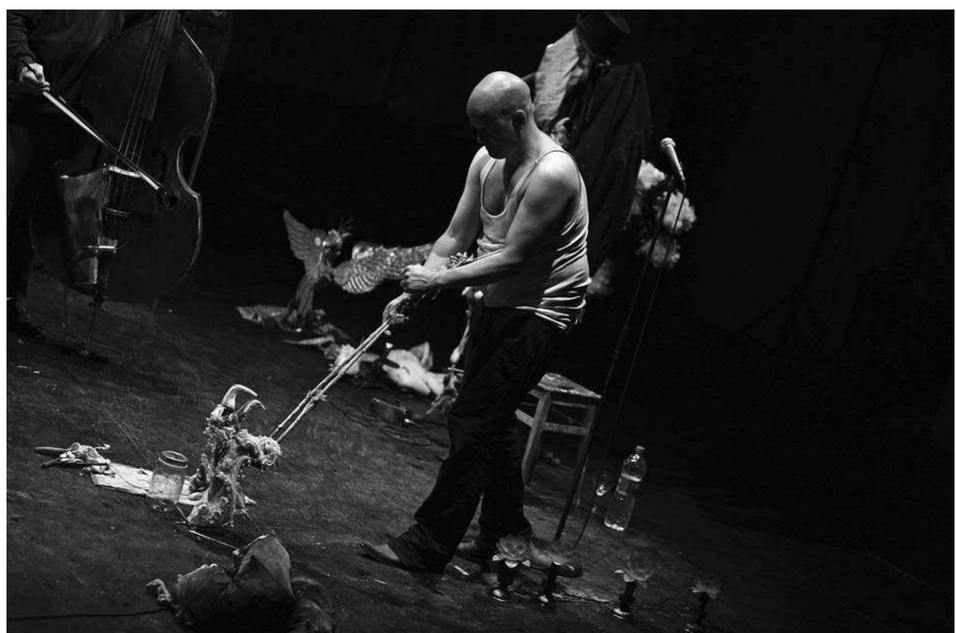 The puppets were quite impressive. They included one hand puppet of a face placed directly  It was not this one clever gimmick that made the show, but rather the production's ability to find a long string of clever gimmicks, each one more  Lewis Carroll's Songs for Alice, directed by Hendrik Mannes. Recklinghausen, 2013. Photo: Therese Stuber. 