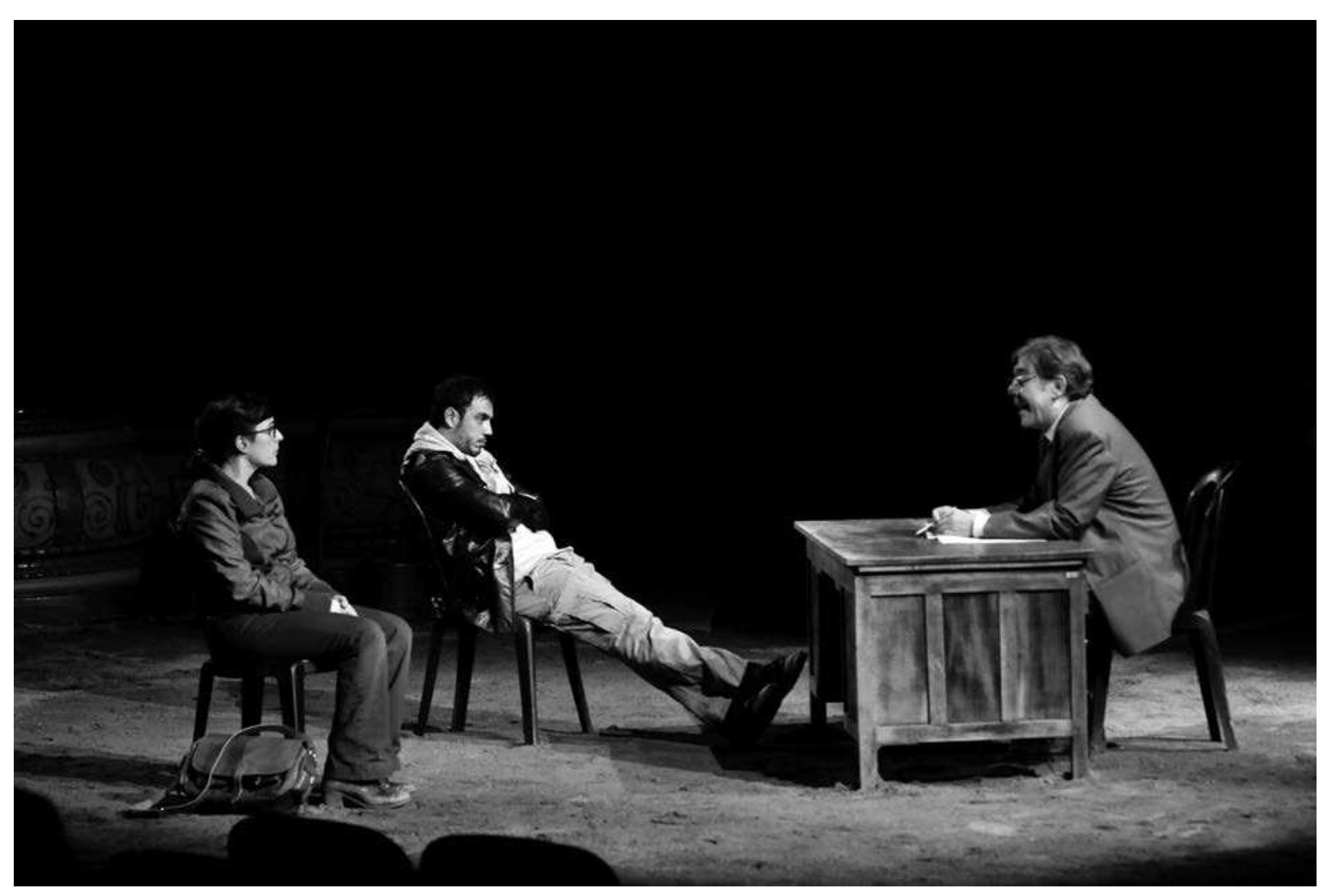 Oriol Broggi’s Scorched at the Romea theatre. Photo: Bito Cels/Romea theatre.  The tale gravitates around the twin children of Nawal Marwan, Janine and her brother Simon, who are told by their dead mother's solicitor, Lebel (Xavier Boada), of the task she has set them. Janine is charged with finding their father and Simon their brother—both figures they have never known—to  Scorched (Incendis in Catalan) begins as a thriller that sees the twins as unwilling detectives going back to their mother's homeland to dig around the past. The narrative shifts from past to present across two narrative streams that converge at the play's end. The first is effectively set up by the opening scene as the siblings meet with their mother's solicitor. It focuses on Nawal's past from adolescence to grave. We see her as a teenager full of idealistic hopes and dreams; we witness her politicization by the difficult social and religious climate, as an adult prisoner caught in the horrors of what we presume is the Lebanese Civil War of the 1970s. There is no  