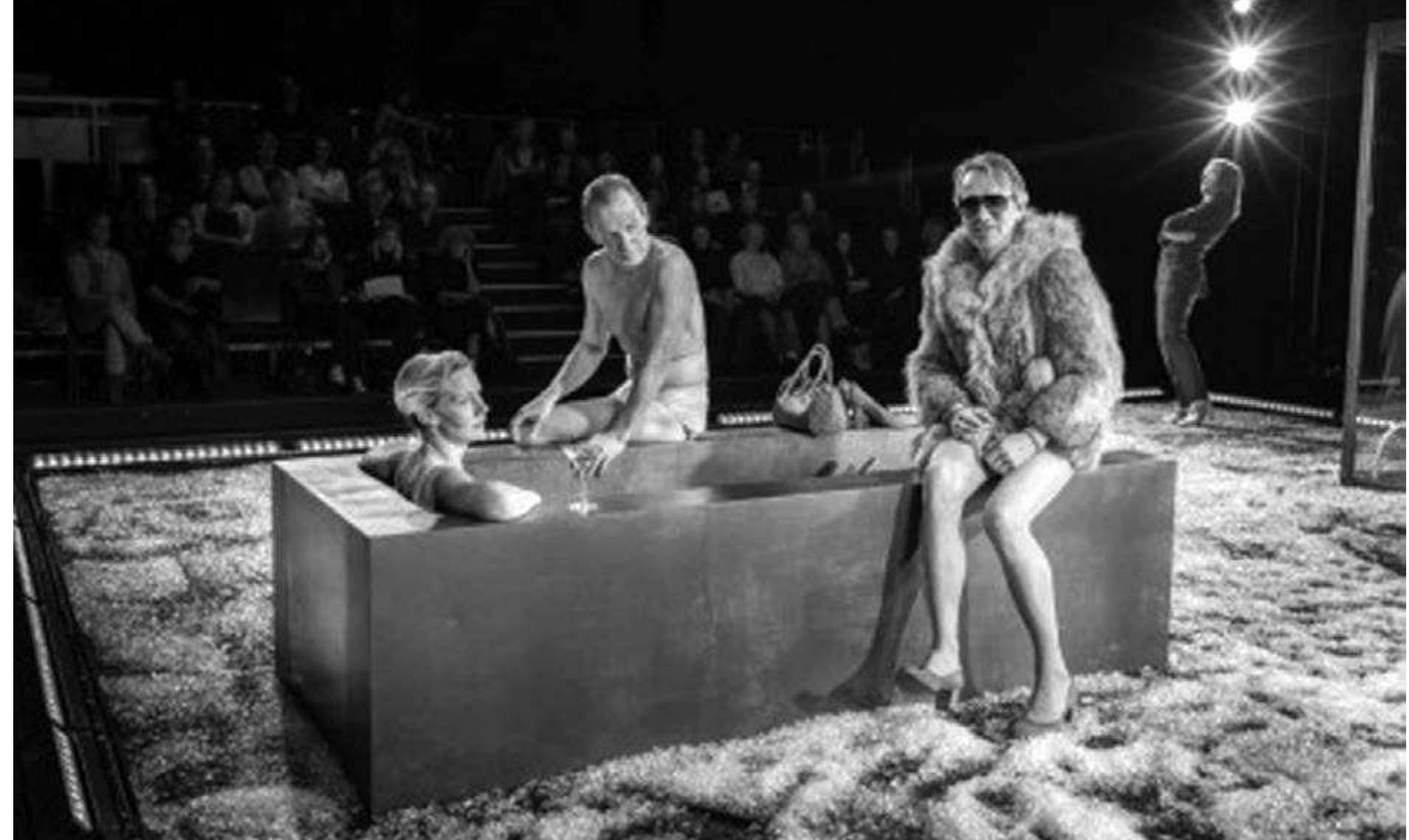 Elfriede Jelinek's Die Strasse. Die Stadt. Der Uberfall, directed by Johan Simons. Photo: Courtesy of Munich Kammerspiele.  Now that Hartmann's administration at Leipzig has ended there is considerable speculation in Berlin that he may be selected as the successor  This series of variety acts— including literal clowns, Lewis-Carroll-type white rabbits, mechanical ballerinas, nude couples, imitation Napoleons, actors howling like wolves, and a deformed half-nude female figure crawling slowly 