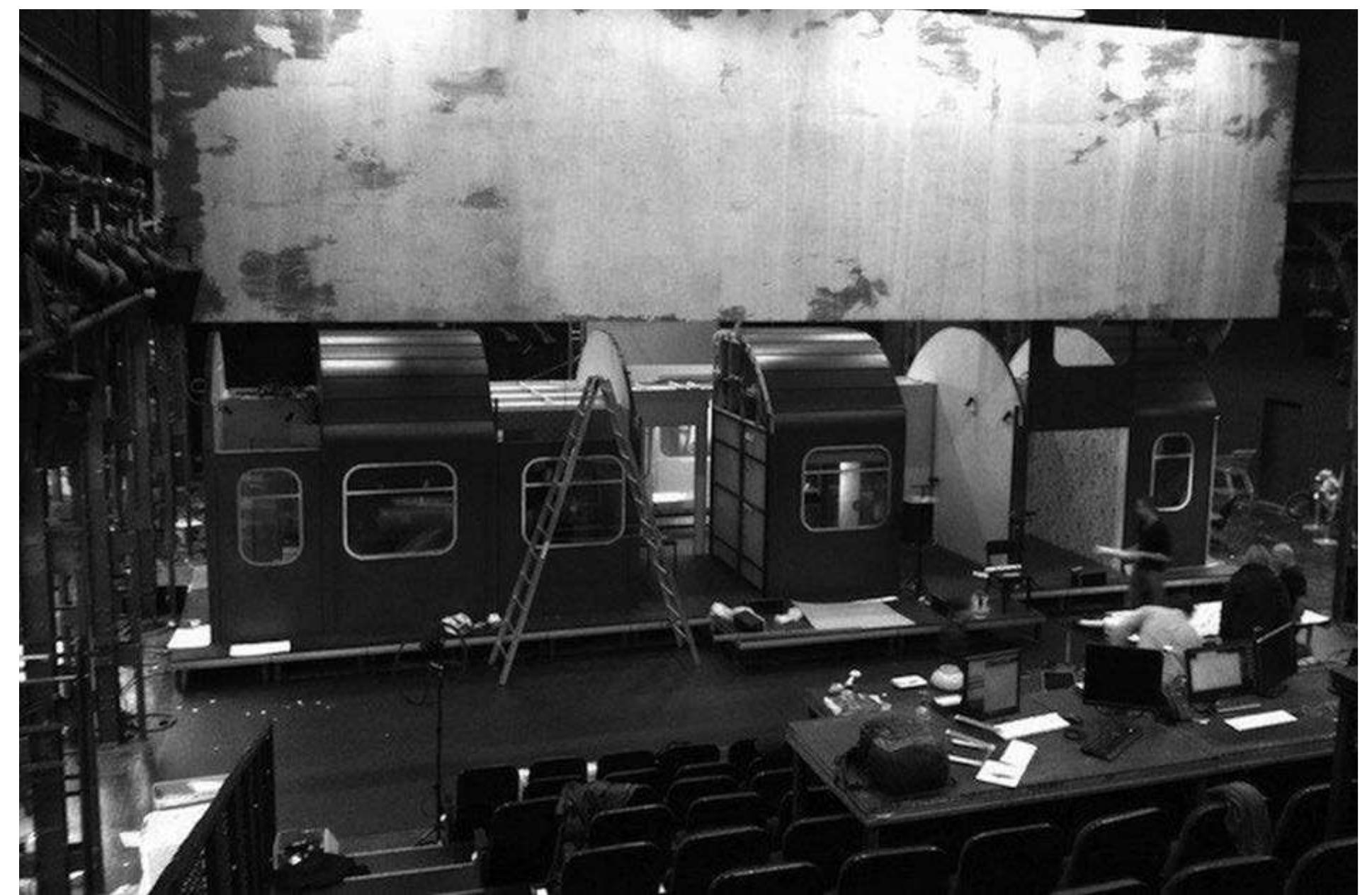 Katie Mitchell's Night Train. Photo: Courtesy of Theatertreffen.  In the second part the focus shifts from the general to the particular, and the production strongly shows its Munich roots. The focus now shifts to a central figure of the Munich fashion world, Rudolph Moshammer, played in a grotesque parody mask and wig (both of which he eventually tears off) by Benny Claessens. The near-legendary Moshammer's boutique "Carnaval de Venise" was at the heart of Maximilianstrasse's fashion world, creating designs  Jérome Bel is internationally known as one of Europe's most innovative choreographers, and one of the leaders of the "non-dance" movement in new French dance, which emphasizes multimedia work, performance in unconventional spaces, and 