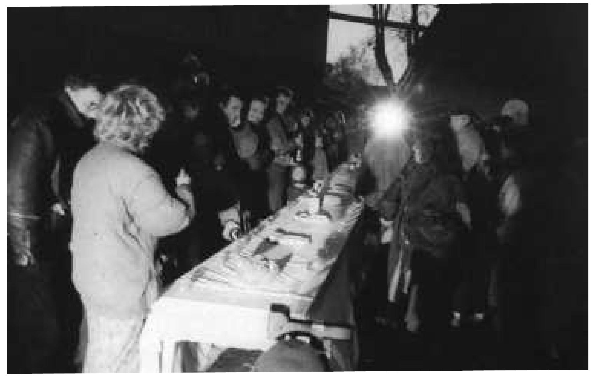 The village inhabitants (on the Danish/German border) were invited to visit one of the farms, which had a large, rectangular yard. Upon entering everyone pressed their hand for a moment against a pure, white, freshly starched cloth in an act of symbolic purification.  A large table set with simple dishes stood across the yard, and the feast was the first --in the locals’ memory-- opportunity for them to develop close, natural contact. 