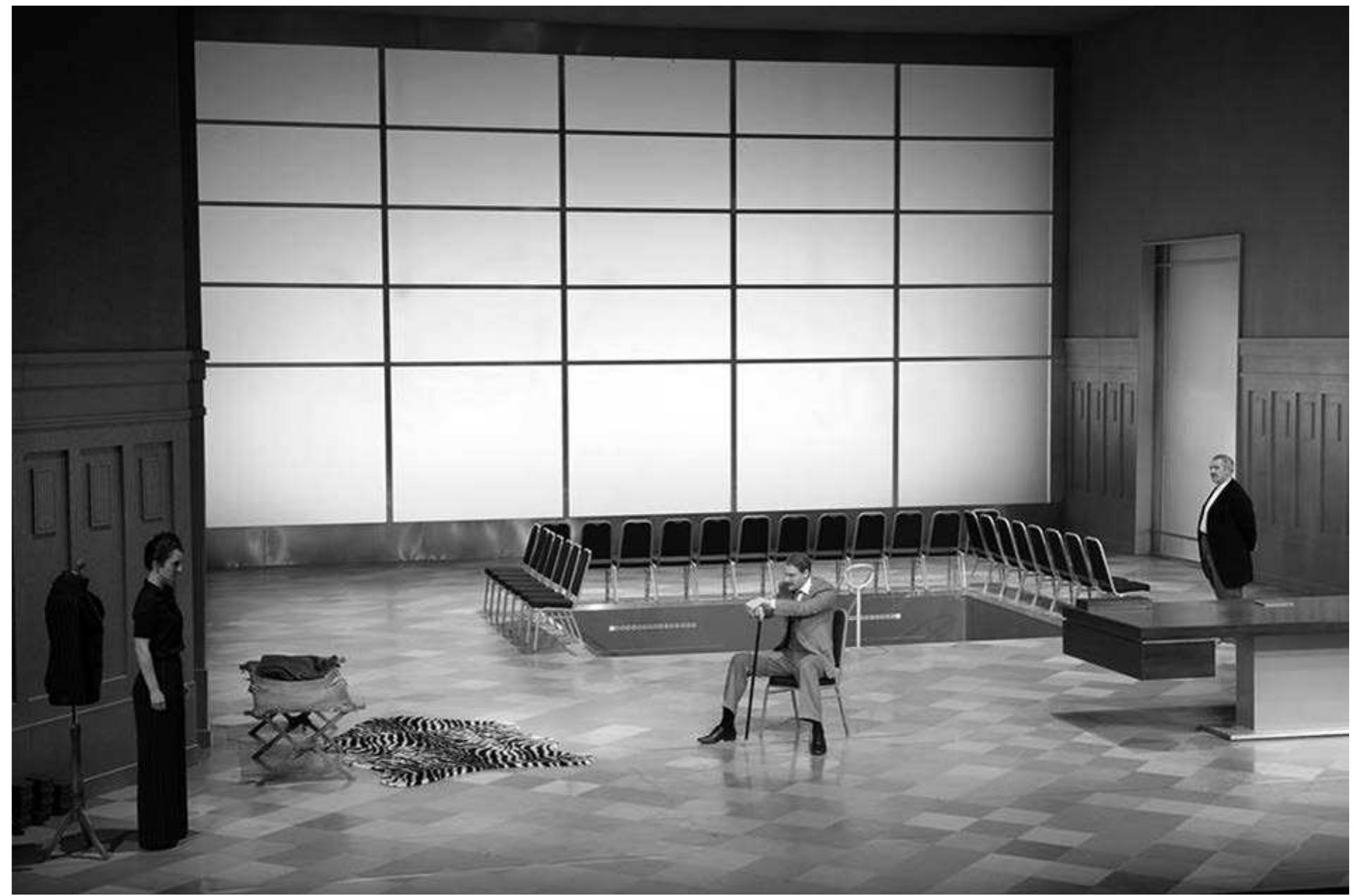 Sternheim's 1913, directed by Anselm Weber. Photo: Thomas A urin.  In the third play, Maske von Buchow (as head of a large industrial manufacturing. Although frail health, he still insis in his own hands despite  1913, the aging Christian he is now known) is the concern involved in arms in his seventies and in ts on keeping the reigns the intrigues of his eldest  daughter Sofie. His son Ernst Philip has no interest  in in Ottilie turns in favor of a 1913 has a contemporary élite, unregulated dealing, brute exploitatio needs of society at large. vampire world of Go parallels Reto Finger version of the play, a lot of research and  her back on  the family business and prefers to spend his life Bohemian circles, while his favorite daughter  the cold financial world  more idealis  dman Sachs. To drive home chose to write his own updat 2013. reading. This shows not only  tic life. In many respects resonance: the economic  financial capitalism, wheeler-  n, and contempt for the  We are not far from  Finger has clearly done  in his copious program notes and analysis but also  (alas) in  than a short primer in modem capitalism divid  into lengthy monologues choral dialogues showerin  his text, which turned out to be little more  ed interspersed with spoken g us with such revelations  The theatre in Bochum must at least be congratulated for its attempt to provoke a debate on the dangers inherent in uncontrolled individualism. Even more so, because the evening consisted of plays with stories, characters, conflict, and dialogue. What else, you might object, does one expect to see in the 