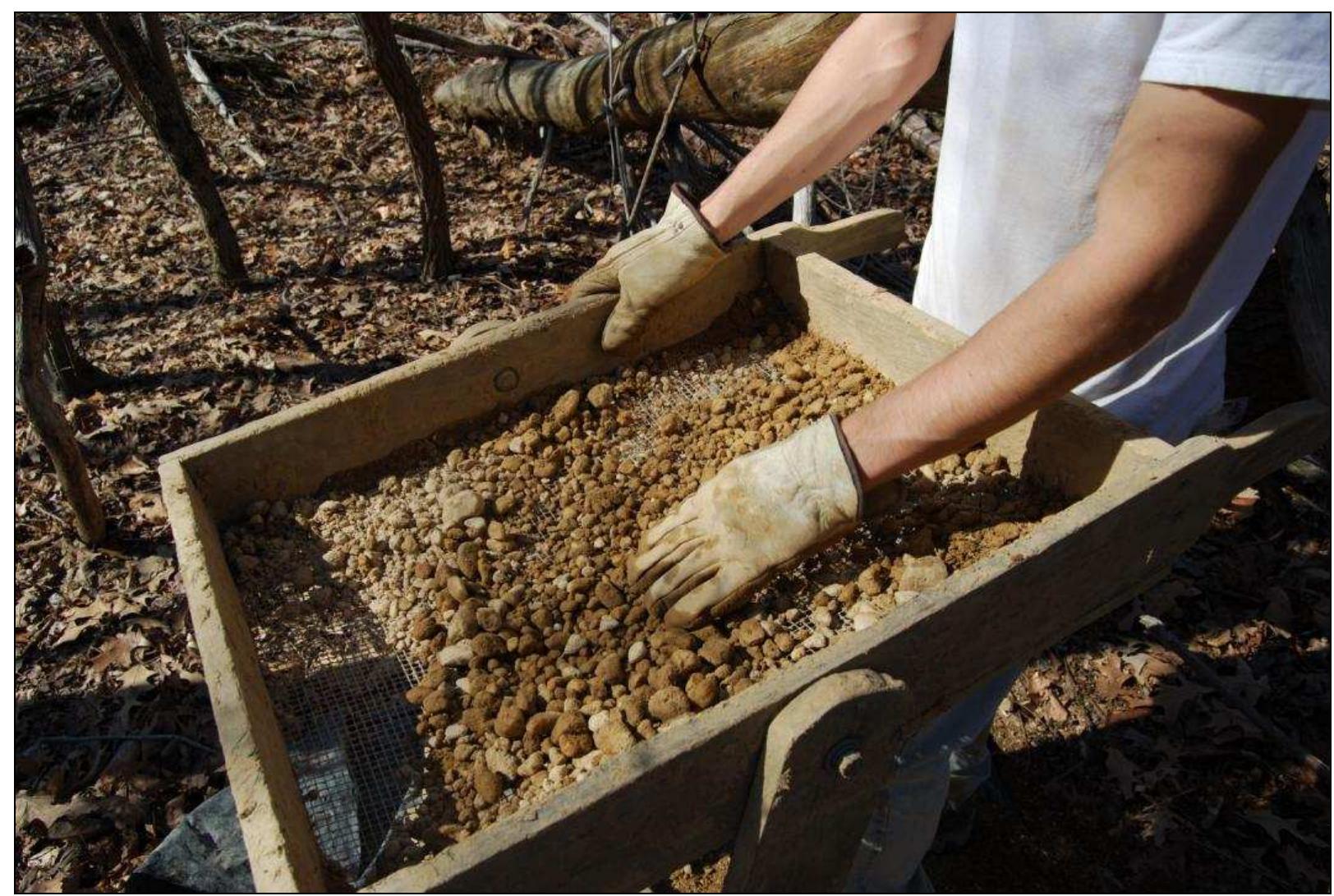 Figure 35. Screening shovel test fill. 