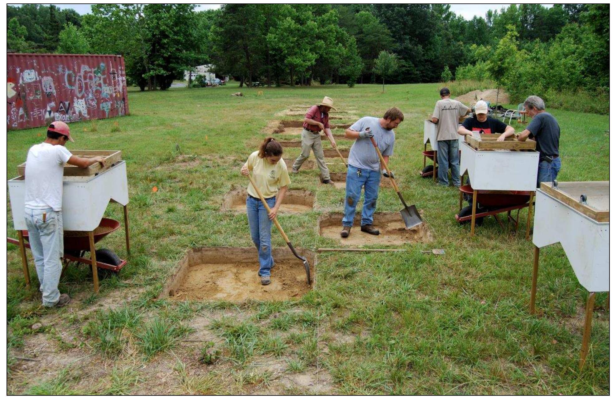 Figure 42. Excavating test units at Windy Knolls I. 