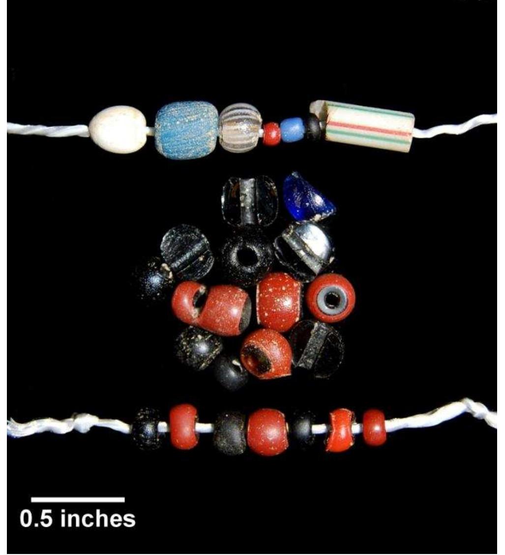 Figure 79. Glass beads from test units, Windy Knolls I. 