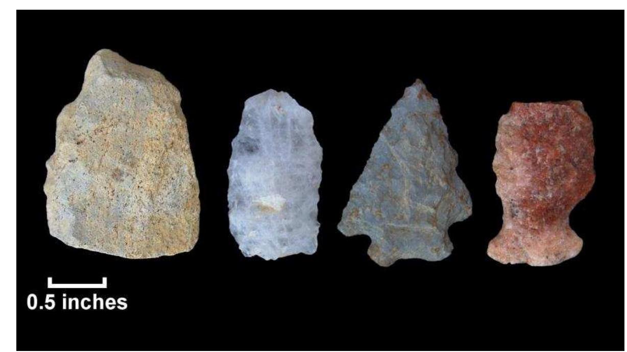 Figure 109. Stone tools recovered from shovel test, Jordan Swamp I; l-r: rhyolite biface (Lot 43); quartz biface (Lot 33); rhyolite Kanawha point (Lot 75); quartz point, possibly Halifax (Lot 64). 