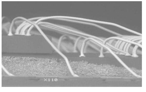 Fig. 4. Stacked wire bonding configuration developed in this study.  Looping profile for stacked wire bonding built in this package requires a combination of high and low looping to prevent wires from touching one another. To ensure no expose wire the wire bonding for top die was control to have lower looping as compare to the bottom die. Therefore only the wire bonding for top die were optimized and been given critical attention.  