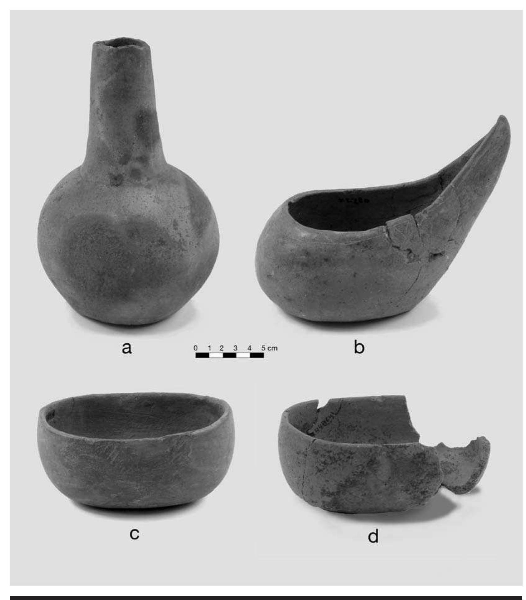 FIGURE 4.3. Whole and partial vessels: a, Smithport Plain bottle (423144); b, Coles Creek redware bow! with hatched decoration (423145); c, Sanders Plain oval bowl (448641803 or 423146); d, Sanders Plain/Old Town Red oval bowl (448641s01). 