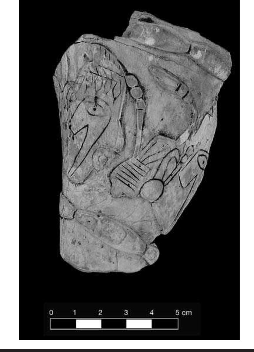 FIGURE 4.26. Distal fragment of Craig A style cup excised in low relief with incised decoration (423297). Depicts human heads ar- ranged in horizontal registers. 