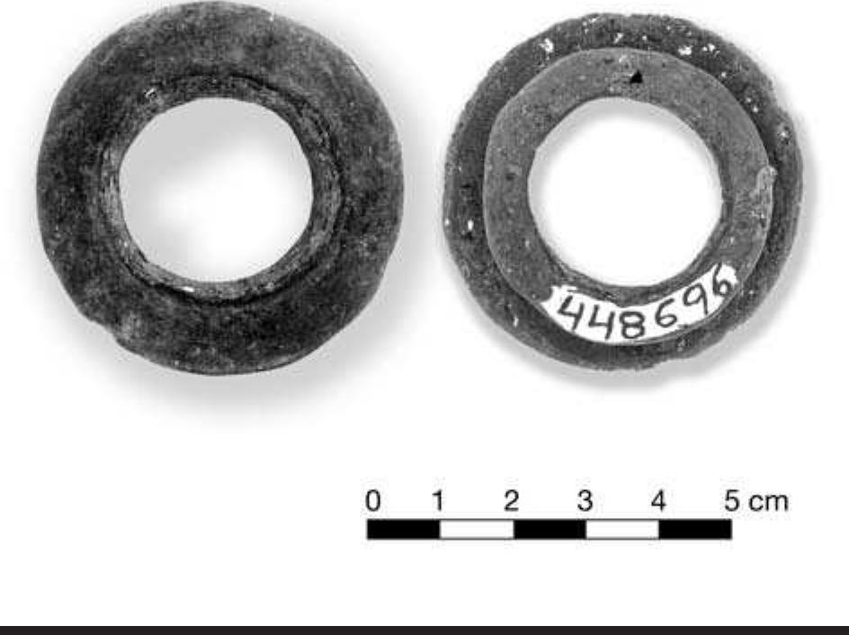 FIGURE 7.7. Ceramic flanged ring earspool, both sides (448696). 