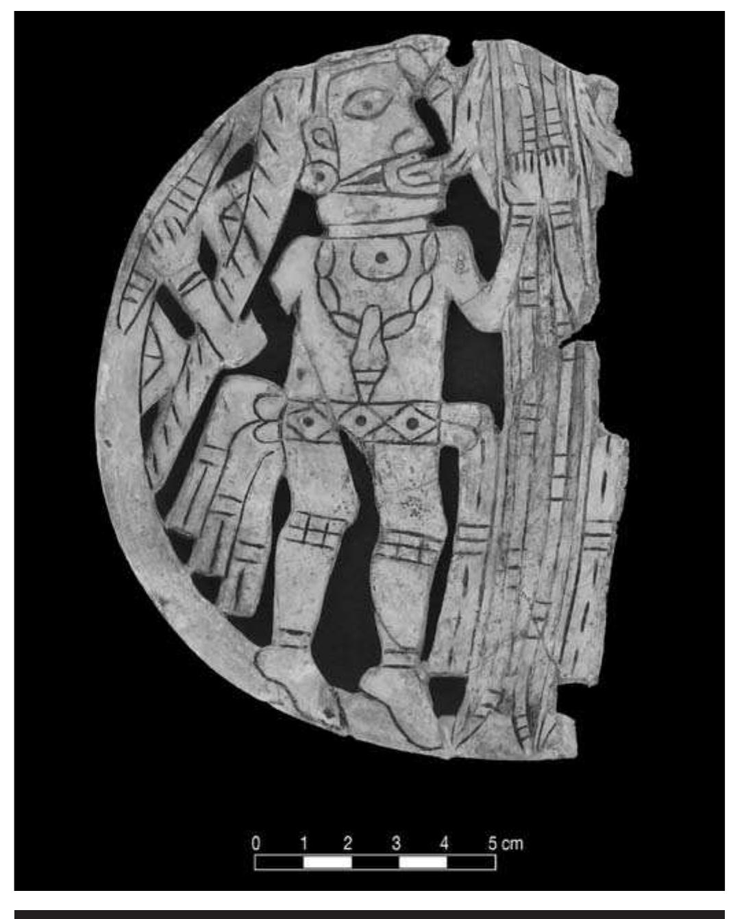 FIGURE 7.32. Gorget showing man facing forked pole (448742). 
