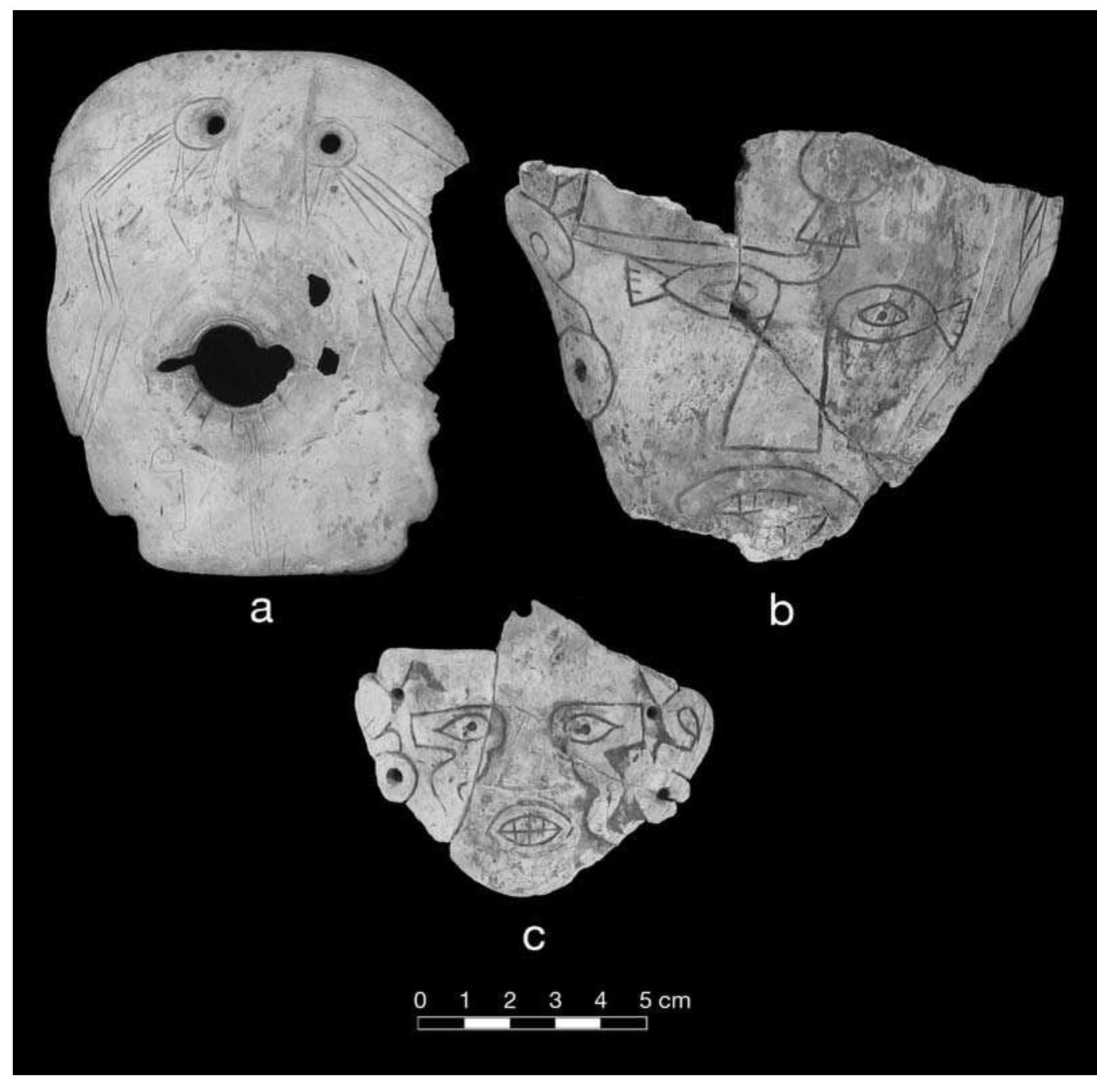 FIGURE 7.37. Masks: a, whimsical face cut from shell apex (448743); b, Craig B style face (448861807); c, Craig B style gorget (423295). 