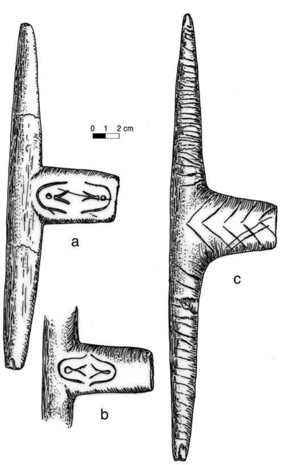 FIGURE 8.3. Decorated T-shaped pipes; a, painted and incised contracting bowl pipe (448658); b, incised cylindrical bowl pipe (423157); c, incised pipe. 