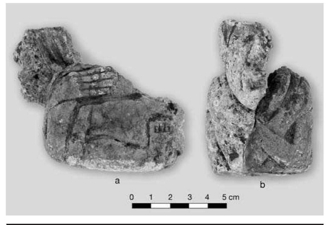 FIGURE 8.9. Crouching human effigy pipe: a, side view; b, front view (423160). 