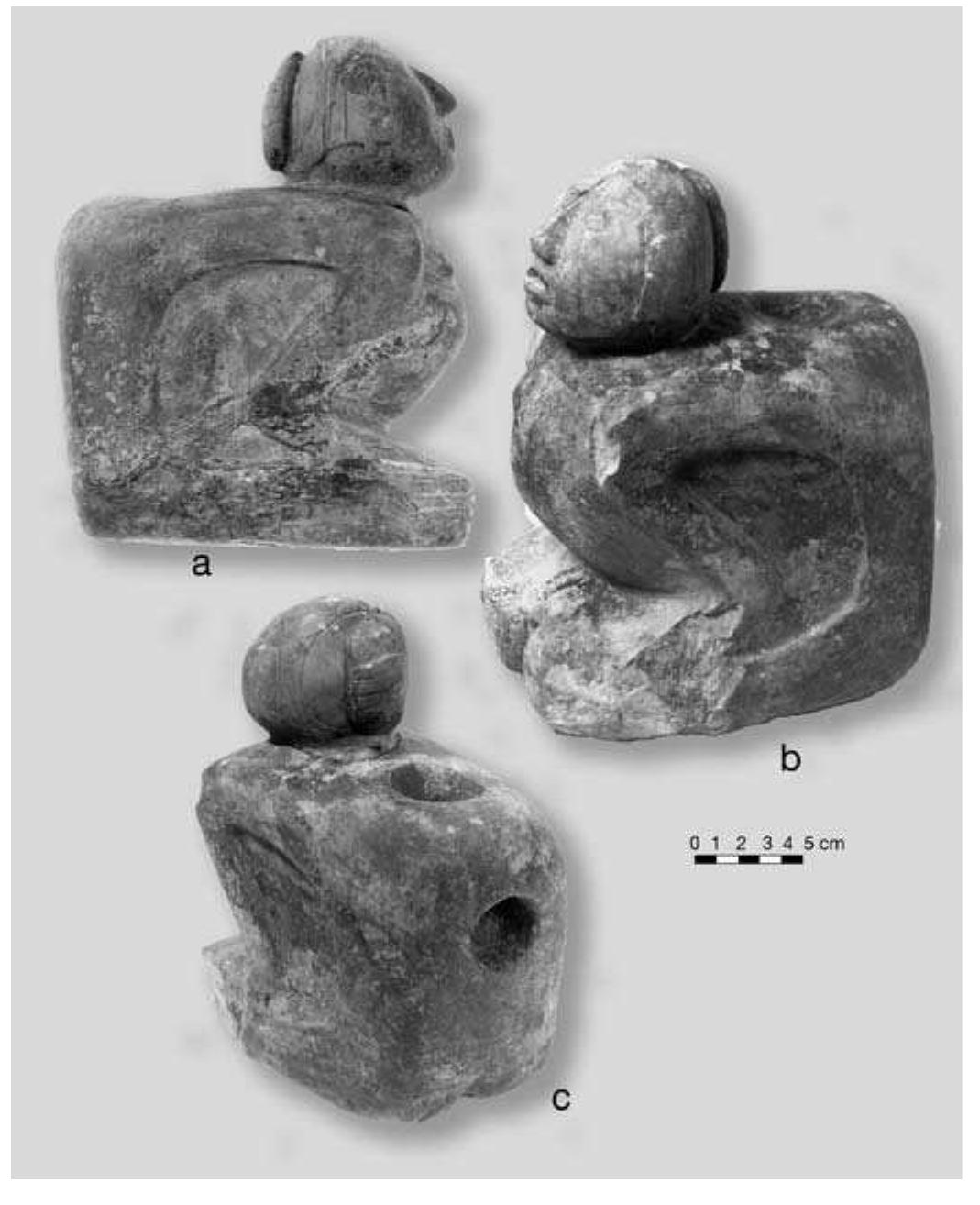 FIGURE 8.10. Human effigy pipe (448669): a, side view; b, oblique view front; c, oblique view rear. 