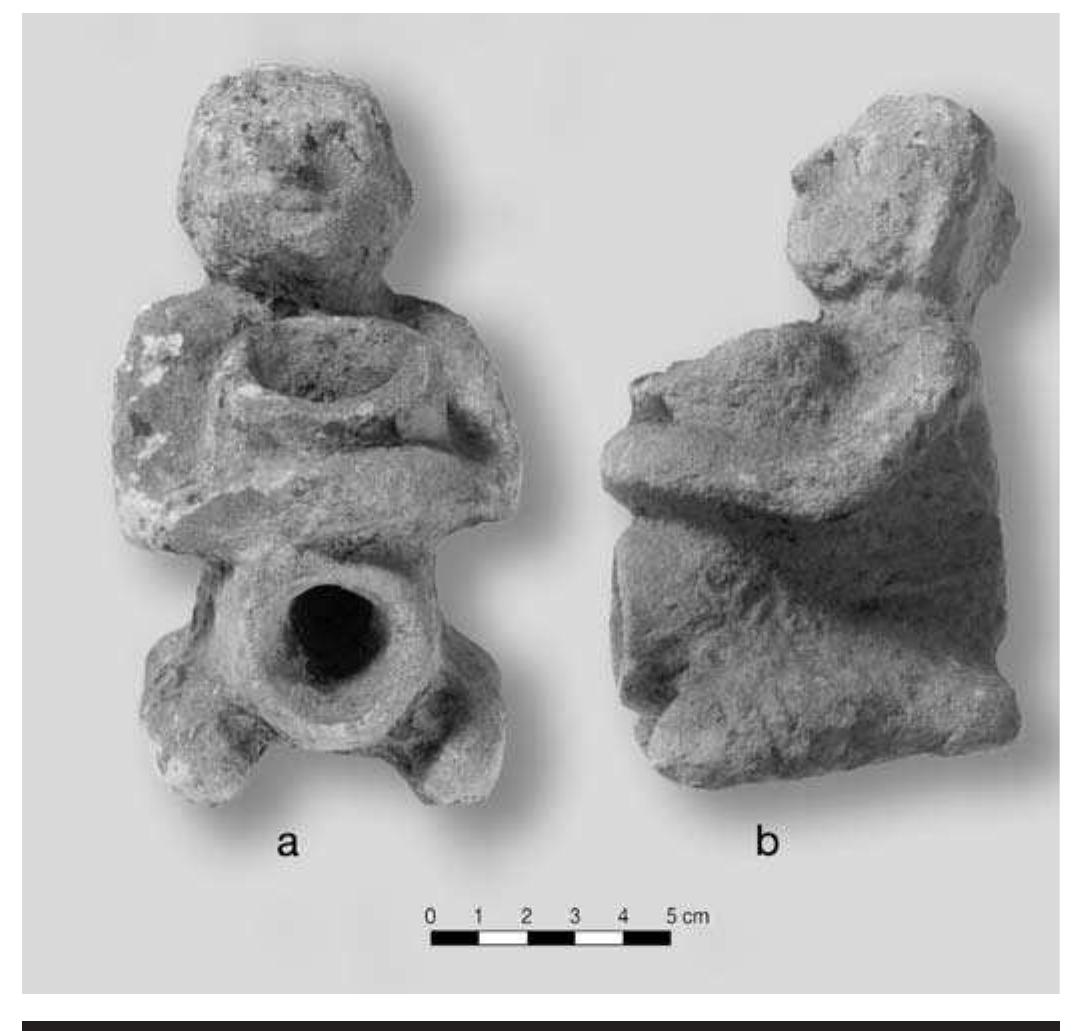 FIGURE 8.12. Human effigy pipe, pipe holder style (448664): a, front view; b, side view. 