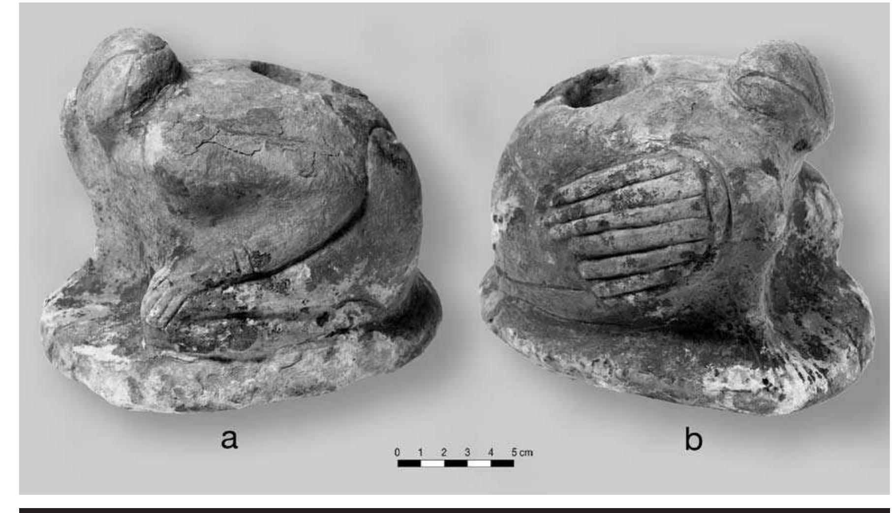 FIGURE 8.14. Oblique views of human-bird effigy pipe (448668): a, left side, the human; b, right side, the bird. 