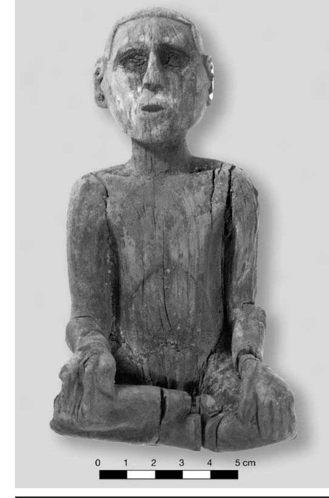 FIGURE 8.18. Wooden figurine, seated “Spiro Man” (448892). 