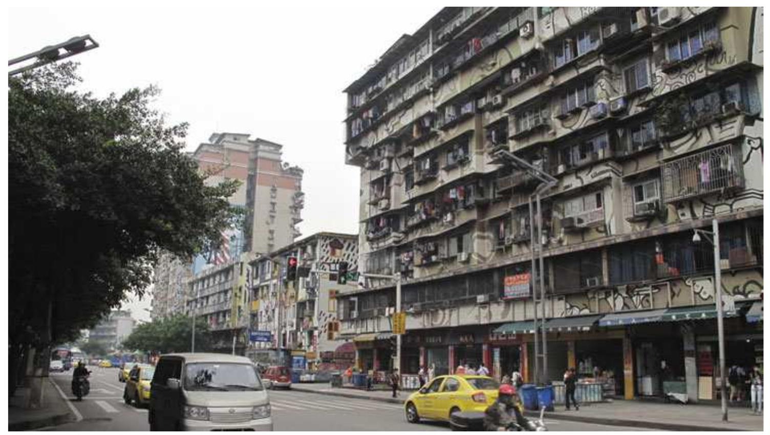 Figure 3. Chongqing Graffiti Avenue.  If we carefully examine how the semantic structure of the concept of ‘graffiti’? (not mural) plays a central role in these campaigns, we immediately face an interesting dislocation. In the West, graffiti’s commercialization into the fashion industry, or even its movement towards high art, is based specifically on its original spirit of criticism of mainstream values. In China, the state’s internalization of this symbolic meaning of graffiti as a formerly miscounted puzzle of an ‘open and tolerant society’ is apparently misplaced. On the one hand, here graffiti has not been commercialized, yet it remains a part of state advertising. On the other hand, the premise of graffiti’s marginal and critical 