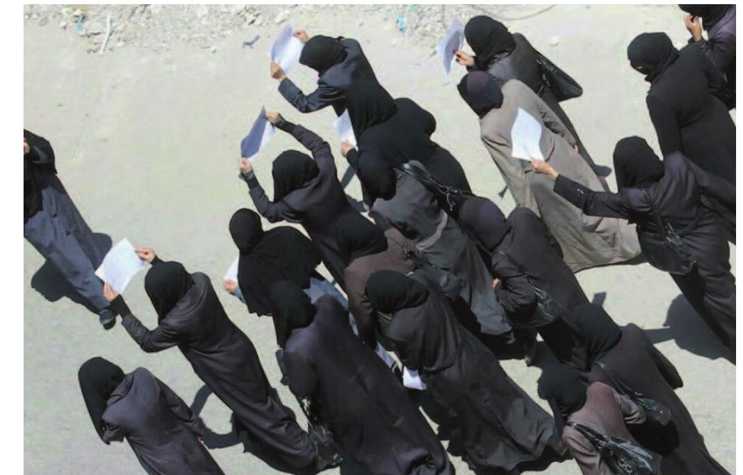 Syrian women in Ghouta demonstrating against the extremist armed group Jayesh al-Islam (Army of Islam). Photo: Siraj pres 
