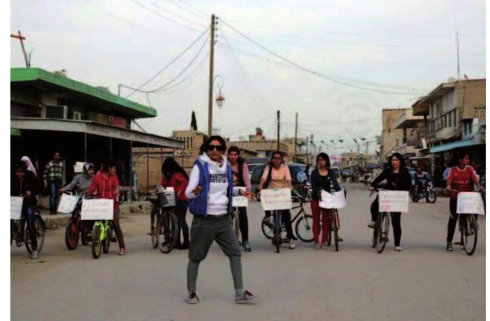 Women demonstrating in Amouda in northeastern Syria as an attempt to question and break limitations of traditions. To ride a bike as a woman in this area is not considered appropriate.  Photo: Arta.fm Radic 