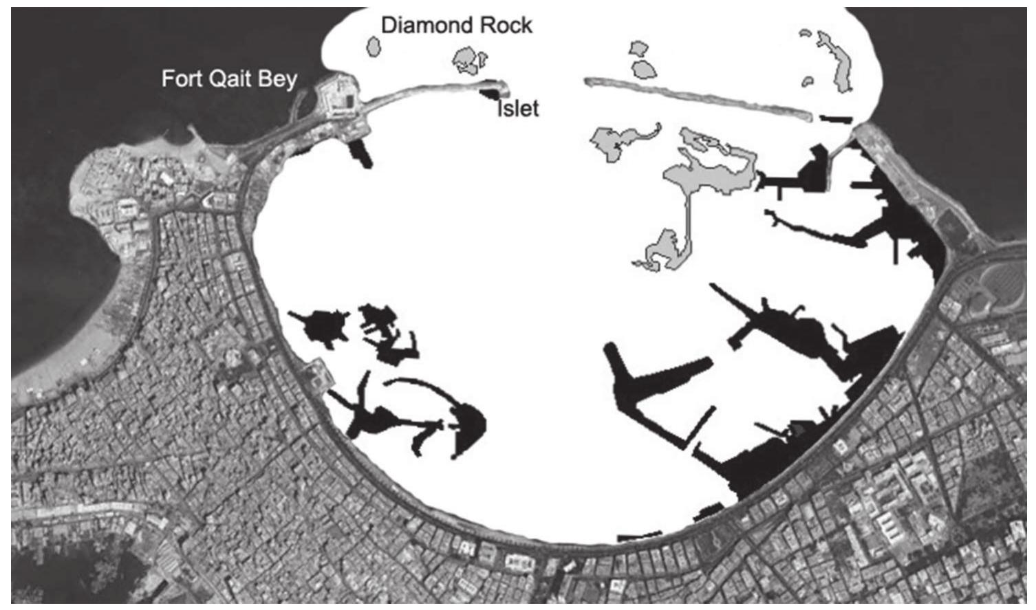Figure 1. Submerged remains of the ancient Great Harbour of Alexandria inside modern Eastern  Port of the city. Port structures that were situated above the sea level in Antiquity are shown  in black while those below it (including natural reefs) are grey-colored. Figure by the author with the submerged structures shown after FABRE, GoppI0, 2010. P. 53, fig.5.1  Today the Eastern Port of Alexandria with its total surface of 600 ha accommodates just a flotilla of fishing vessels of modest size and several dozen yachts. All the intense maritime traffic has long gone to the Western Port, which has the necessary handling infrastructures. Thus the remains of the structures of the Great Harbor (Méyac Aiujv, Magnus portus) are well preserved and con- tinue to provide precious information about the functioning of this famous port and its role in the development of the city. This paper proposes some ideas con- cerning the navigation within this port in Greco-Roman times. 