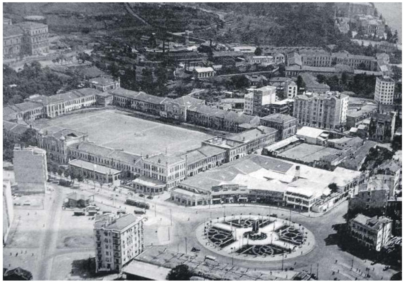 Figure 08, Taksim Artillery Barracks in 1940s, will be placed  of the ghosts (Figure 08). Miicella Yapici (2013), a member of Taksim solidarity and general secretary of Chamber of Architects of Istanbul Metropolitan Branch declares that Gezi Park is the only official tent area in Taksim that can be used after the earthquake. In this respect, this re-construction project suggests destruction of Gezi Park where any building cannot be constructed, since it is the only refuge area for earthquake in Taksim. The ghost of consumerism was tried to be ‘abuse’ for the demands of consumerist society, but the project was cancelled for now (Figure 9). 