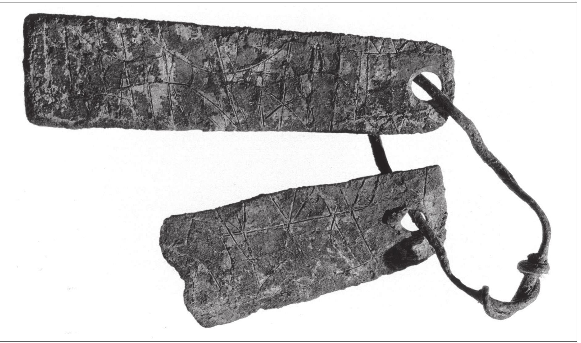 Figure 57. Rune inscribed bronze sheets from the Garrison at Birka. Photo Bengt A. Lundberg, National Heritage Board, 2001 