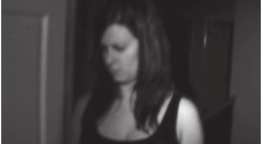 scanning Narrative space. ihe continuity between the him and the surrounding real in the first Paranormal Activity 1s partly due to the erratic camera work, to the frame’s ability to quickly incorporate what is off-screen into the shot, just as it can easily rel- egate what is in the shot to the off-screen. The suspense generated by Micah’s frenzied search for a sleepwalking Katie in the middle of the night, camera in hand, comes pre- cisely from the apprehension about what the bumpy, tightly framed point-of-view shots might encounter—the fast pace with which the handheld camera moves suggests that whatever it finds 1s likely to invade the frame in abrupt fashion (Figures 2-5).  SOs = ee eee 8 ee ge  Figure 2. Katie enters the frame abruptly as Micah’s camera meets her, out of focus in Paranormal Activity (Paramount, 2007). 