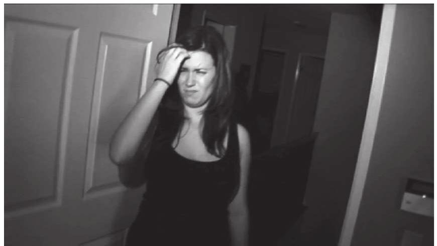 Figure 5. Until he finally manages to properly frame a sleepy and confused Katie, keeping her in the shot and in focus. Paranormal Activity (Paramount, 2007). 