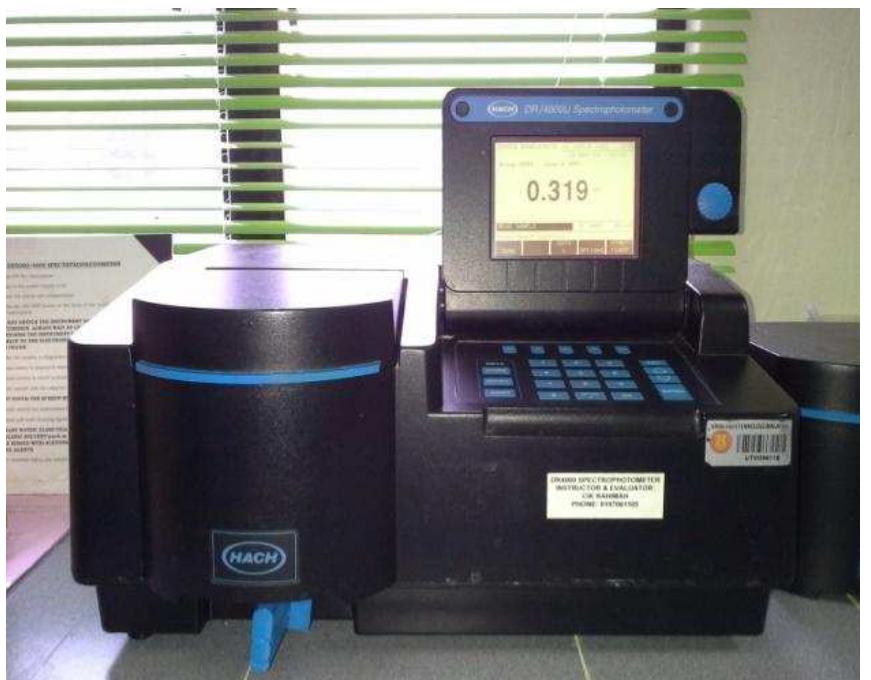 Figure 2: Spectrophotometer DR4000 used for the study.  Turbidity is one of the methods to detect the presence of microorganisms in liquid whicl includes sulphate-reducing bacteria. Spectrophotometer was used to determine the optical density (O.D.) of the assigned broth culture at 600 nm wavelength in this study A sample’s ability to absorb light was referred to be as optical density (O.D.). It car quantify the amount of light from a known internal source that is being transmittec through a sample of detector. Reading of 100% transmittance or zero absorbance of ligh can be noticed if no sample is present. Whereas, if sample was inserted, some source 0: light was absorbed, as it passes through the cell providing reduction in transmittance For this experiment, dilution was prepared in the ratio of 1 ml sample: 9 ml distillec water. 