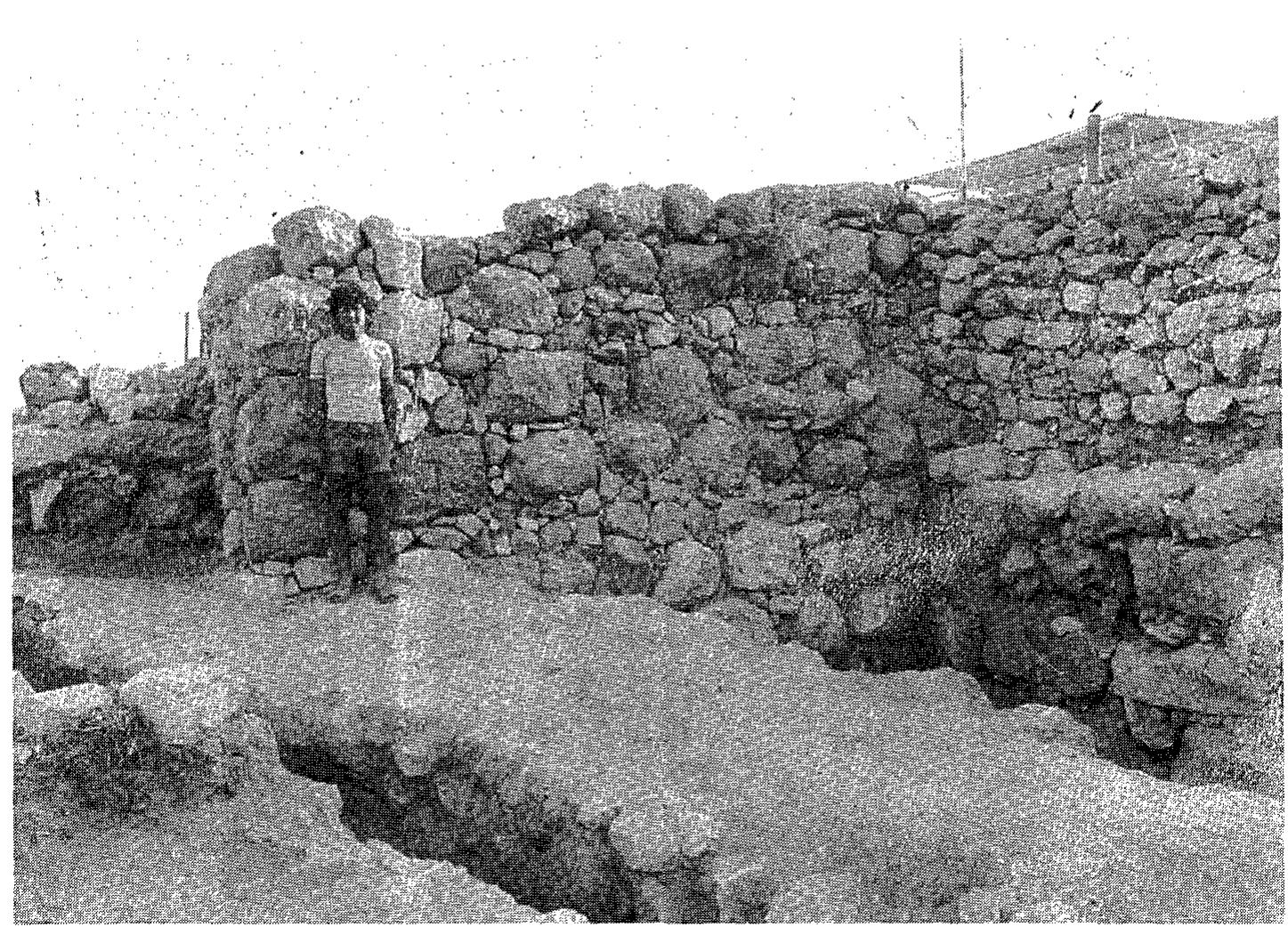 Figs. 38-39. The collapsed corner of the Level II right tower of the outer gate (the ‘guard room’), before and after reconstruction, from southwest. 