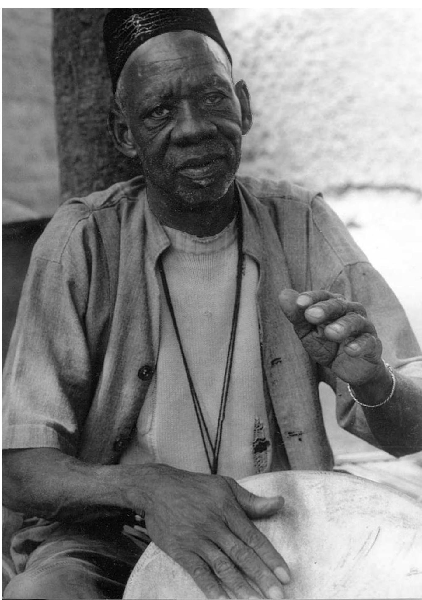 Fig. 8: The late Kati Namori Keita (ca. 1927-1999), owner of the instrument shown in fig. 5 and soloist of sound sample 1, was among the dozen prominent drummers who in the 1960s and 1970s shaped the Bamako style of jenbe playing. He was held to be the last professional drummer in Bamako who refused to accept the iron jenbe. Photo: Polak, 1998. 