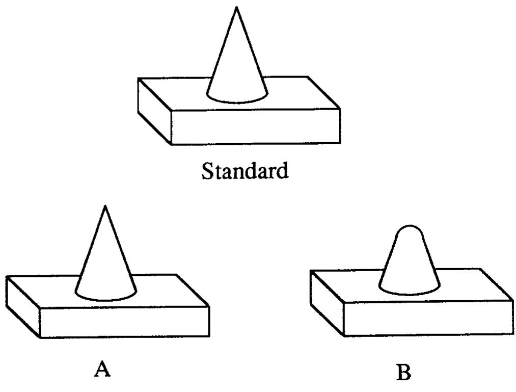 Which object in the lower part of the figure looks more like
