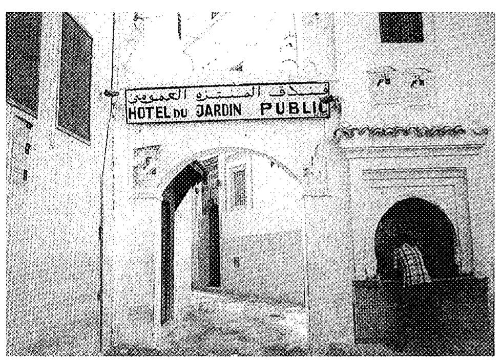 Fig. 8. Fez. Gate in a residential quarter.  ple, repairing and sweeping the channels for waste water in Tunis was the responsibility of each house in turn, that is, the resident of the first house had to repair what was in front of his house and help repair what was in front of the second; the residents of both the first and second house shared the responsibility for helping the owner of the third house to repair his section, and so on. Every- one was compelled to cooperate.” 