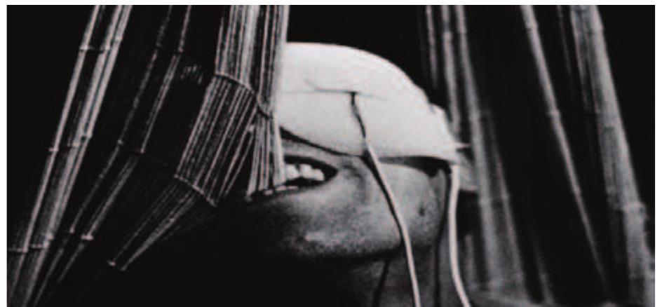 Figure 1. The protagonist is blinded by electrodes placed over his eyes in La jetée (Argos Films, 1962). 