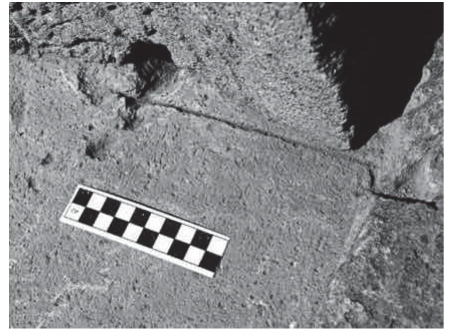 Fig. 20. Setting line and pryholes for circular nonument cut into tufo lionato pavement (Author).  Fig. 19, Setting line for circular monument incised into tufo lionato pavement (Author).  Fig. 18. Incised setting lines on lower course of circular monument (Ioppolo 1966, p. 71, fig. 4). 